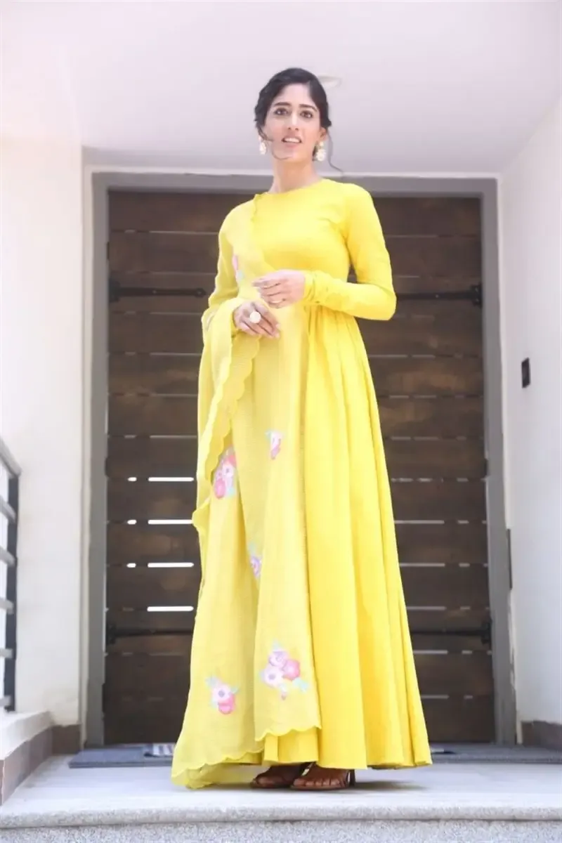 ACTRESS CHANDINI CHOWDARY IN YELLOW DRESS AT MOVIE TEASER LAUNCH 8